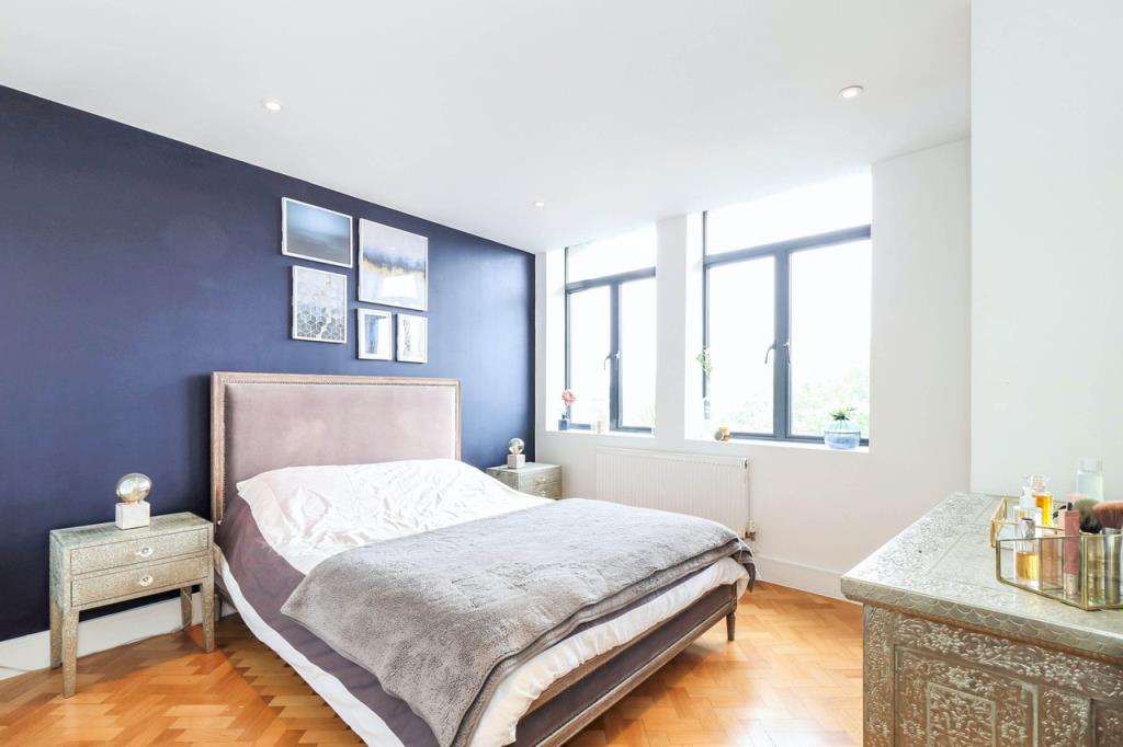 Lot: 122 - TWO-BEDROOM CITY CENTRE APARTMENT - Bedroom One with windows to front and wooden floors
